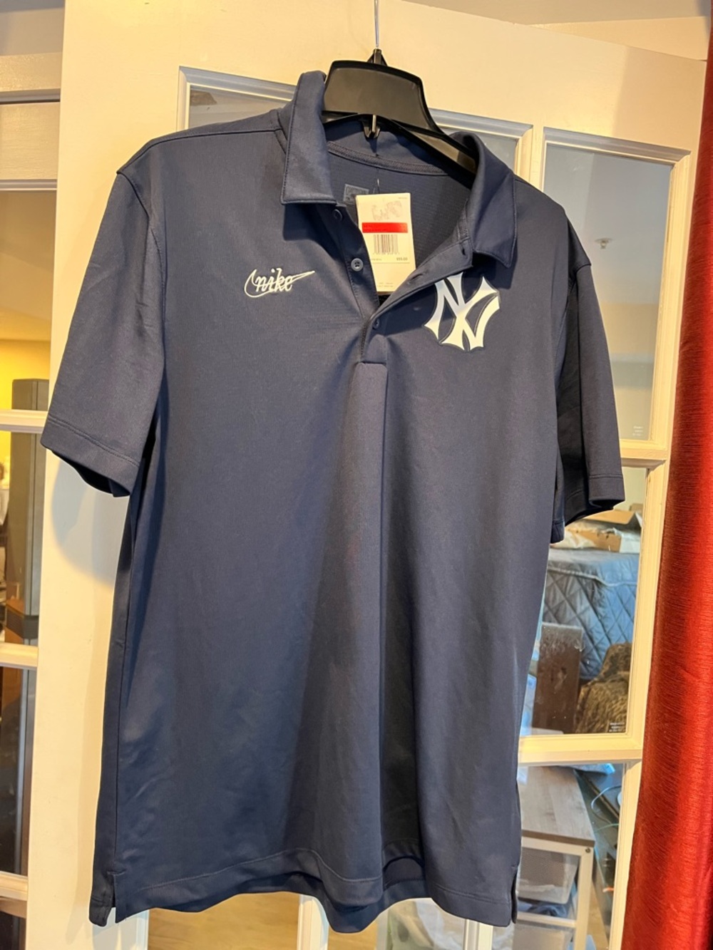 Nike Dark Blue Polo with White Swoosh